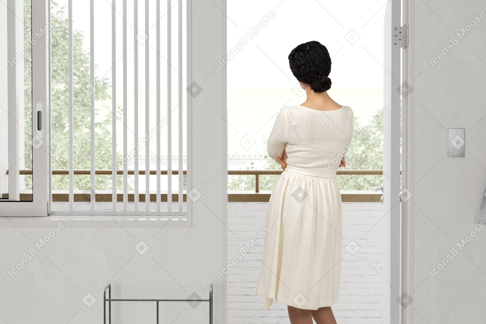Back view of a woman in a white dress standing on a balcony