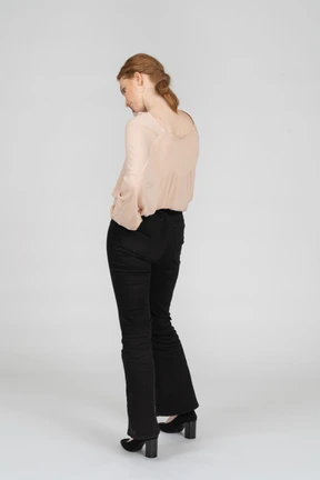 Woman in beautiful blouse standing