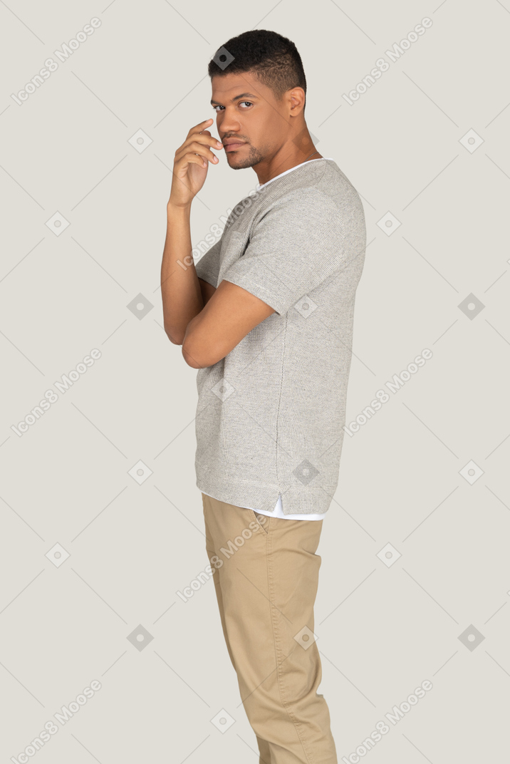 Handsome man in casual clothing looking to the camera