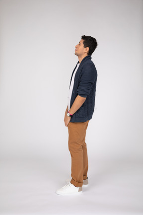 Side view of standing young man