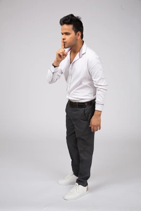 Man in white shirt standing