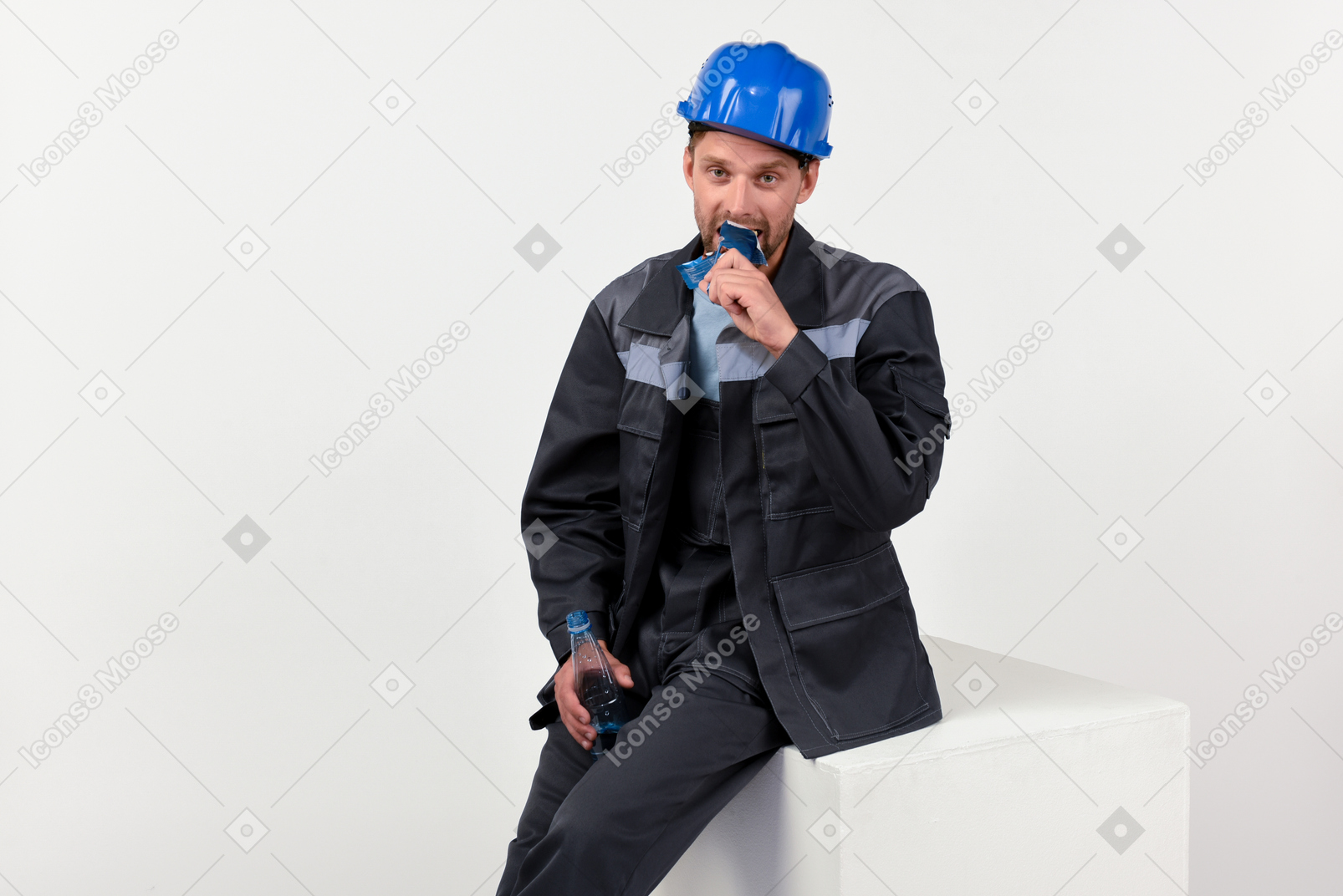 Young construction worker having a break