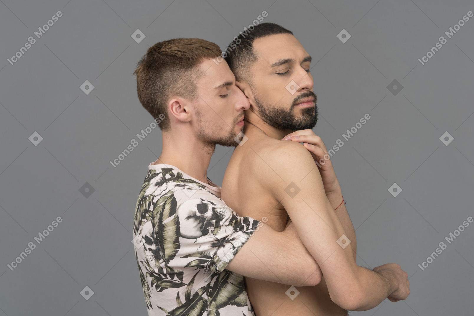 Сlose-up of a young man back hugging his shirtless lover