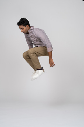 Man in casual clothes jumping