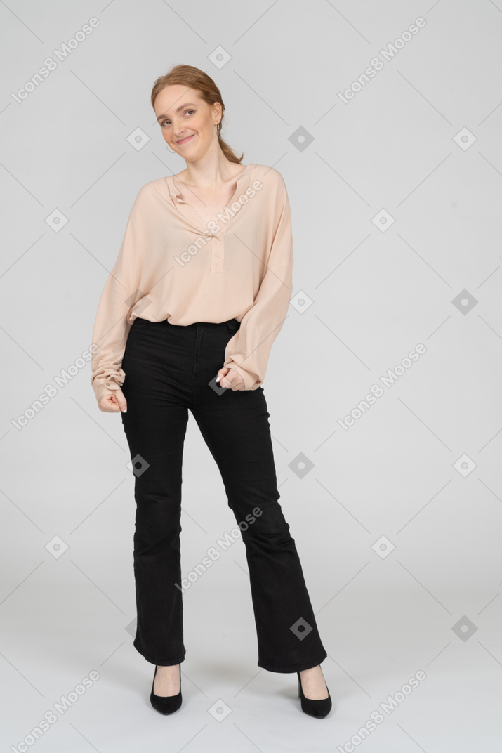 Woman in beautiful blouse standing