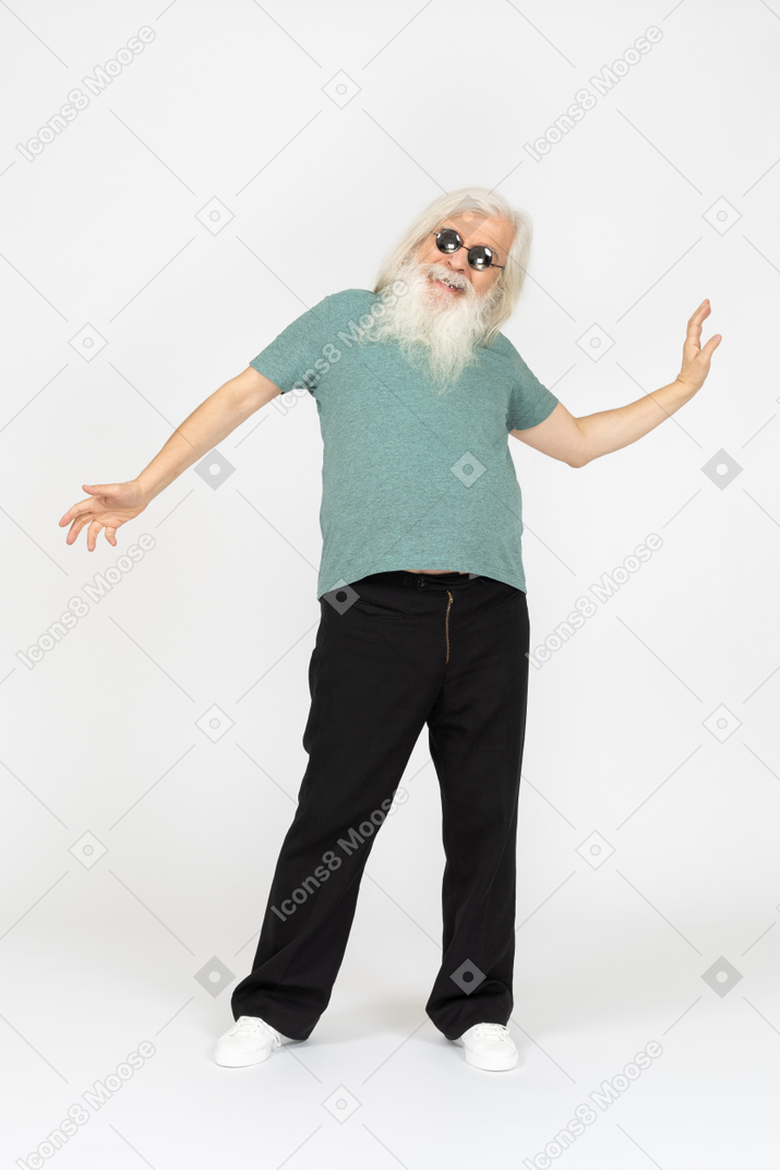 Front view of old man in sunglasses having fun