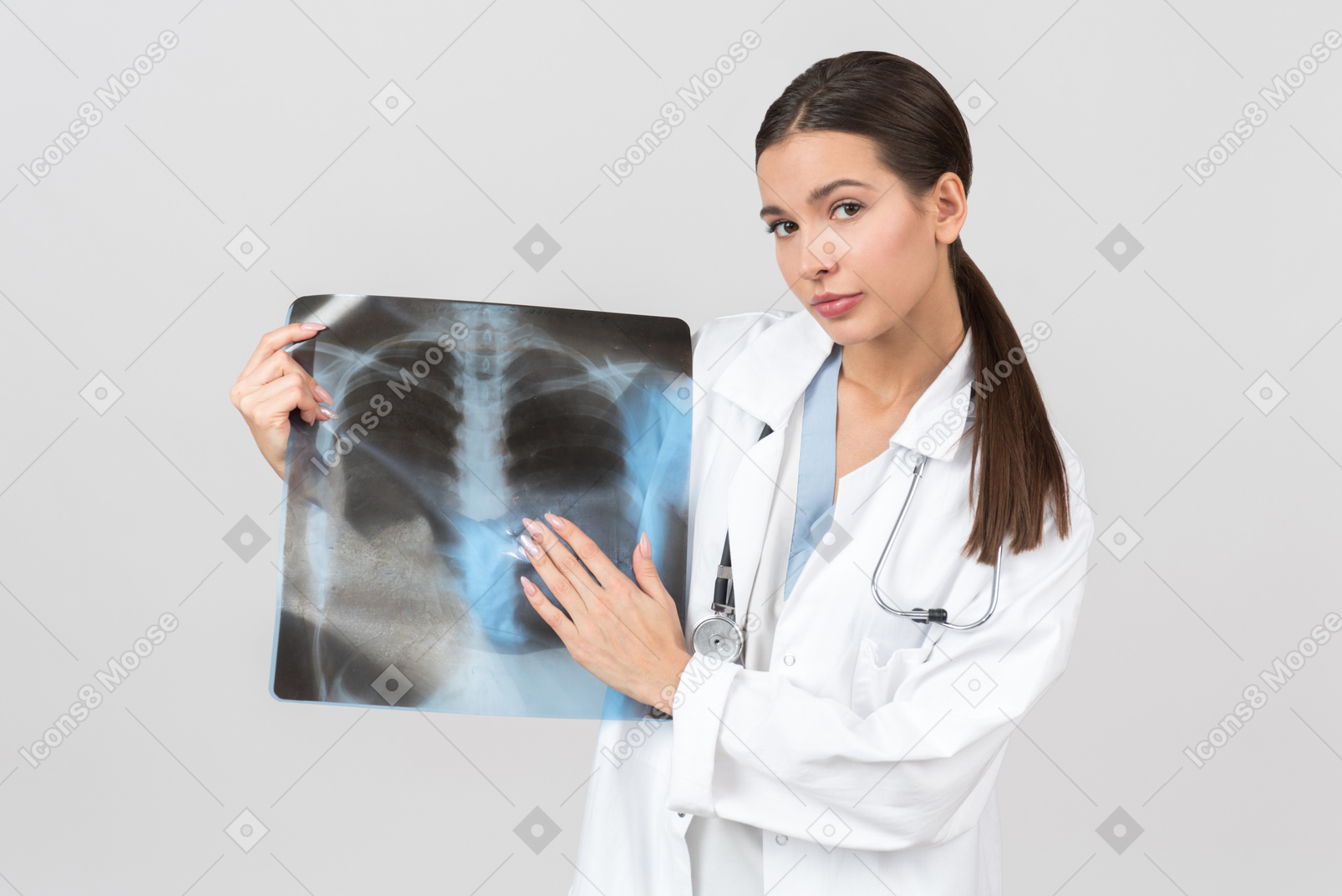 Checking x-ray scan again before examining patient