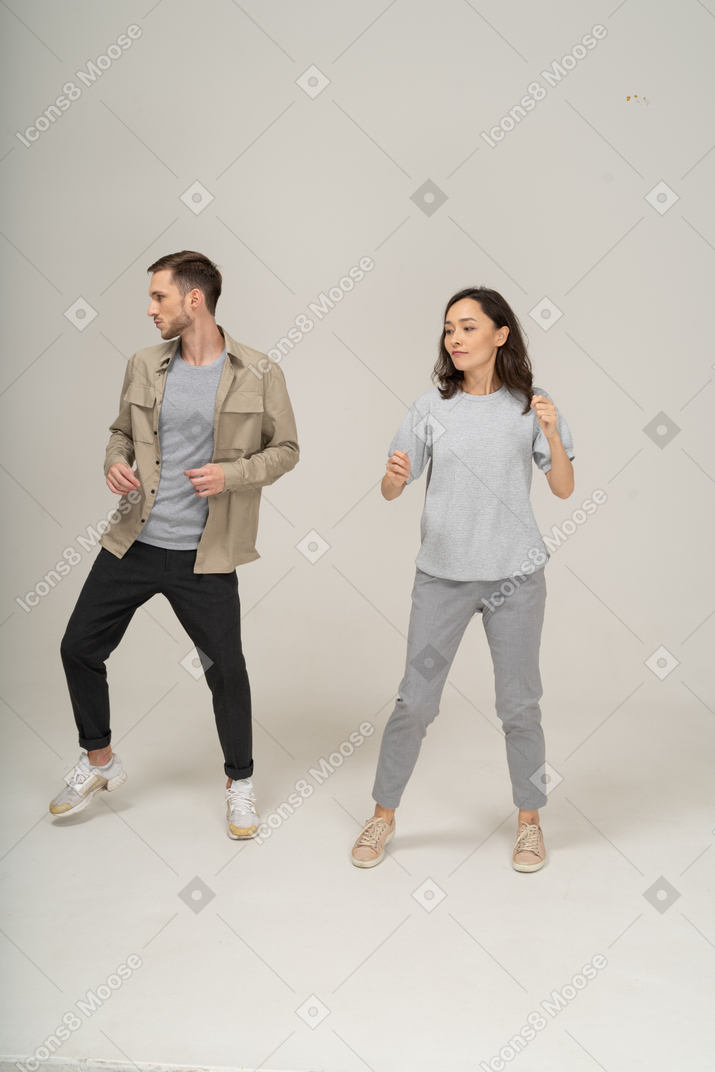 Man and woman dancing side by side