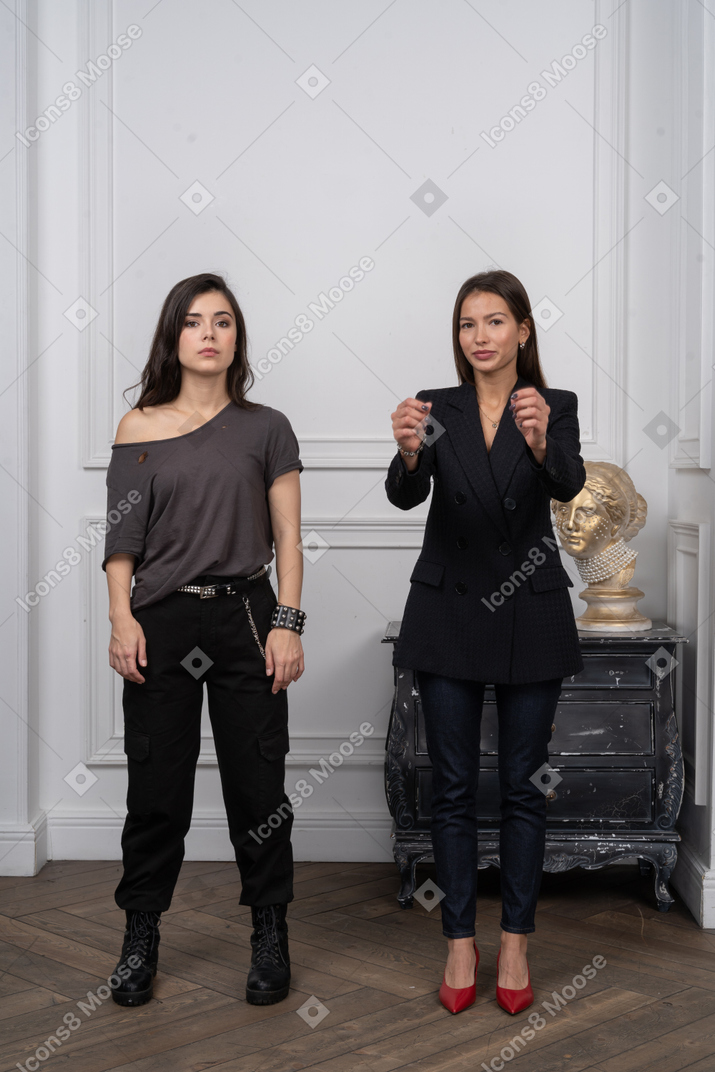Young women standing in a room