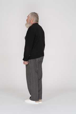 Rear view of old man standing