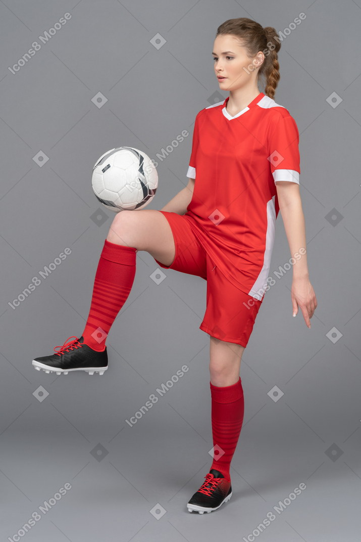 Kicking a football ball