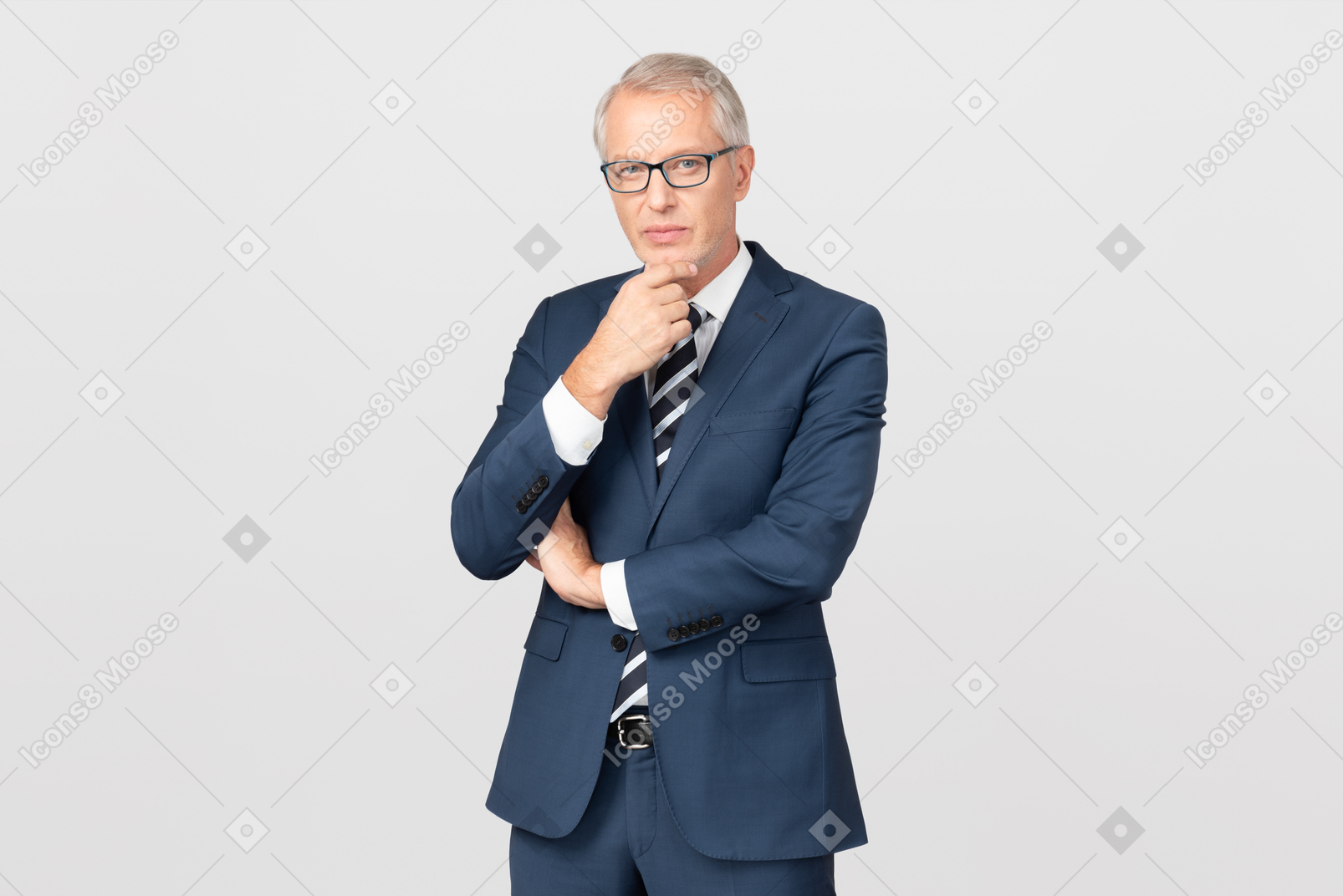 Middle aged businessman touching his chin and thinking