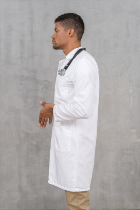 Side view of young male doctor