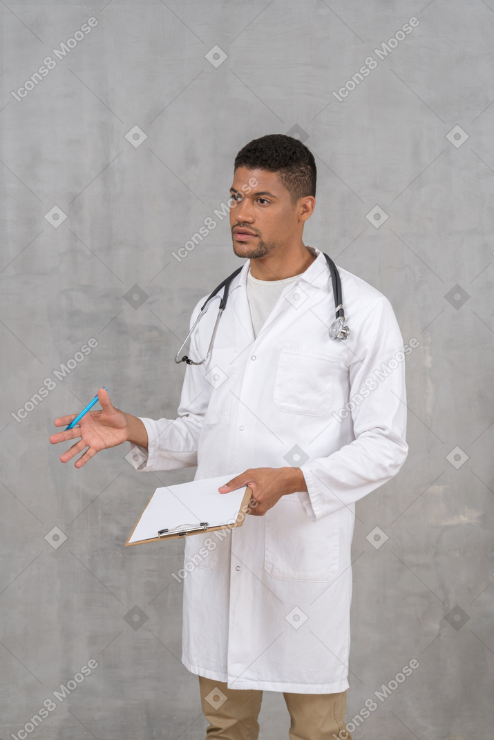 Young male doctor explaining treatment plan