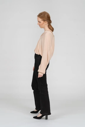 Woman in beautiful blouse standing
