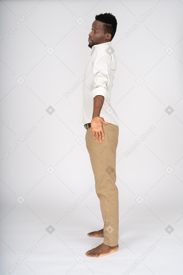 Man in white shirt standing