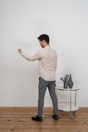 Man in shirt posing and gesturing