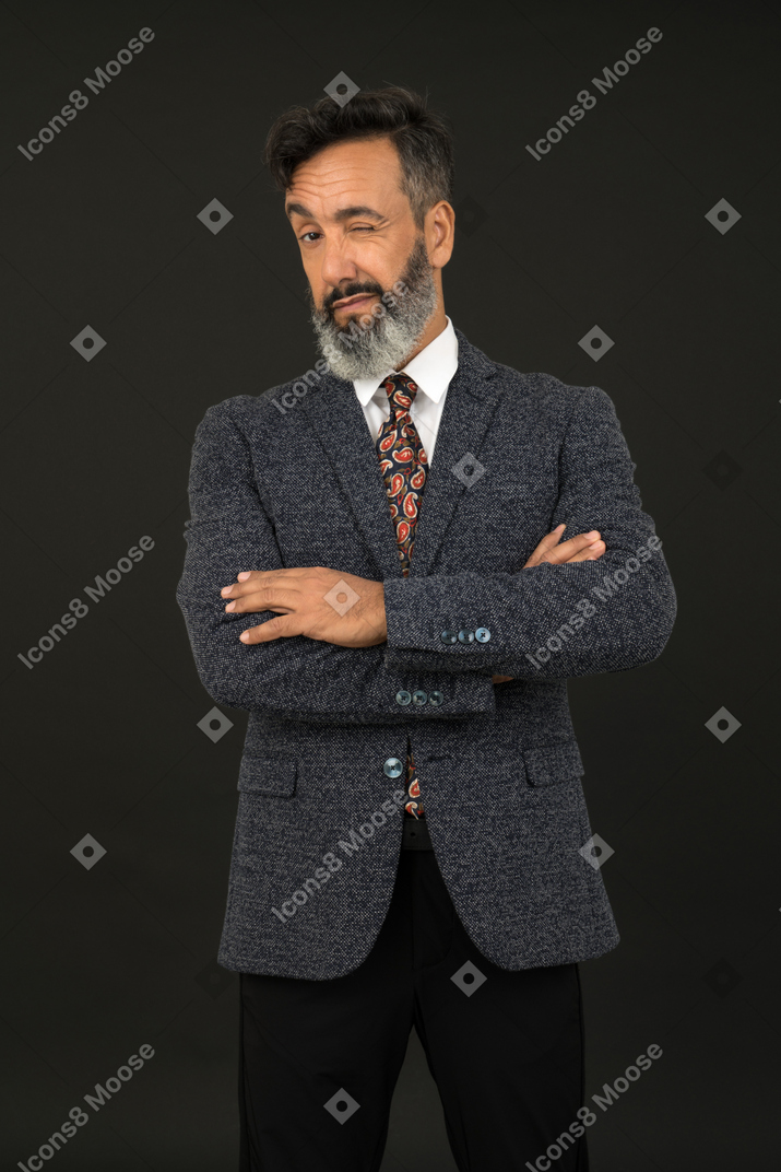 A portrait of a handsome man wearing elegant clothes