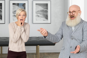 A man and a woman standing in a room