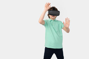 Boy exploring virtual reality world