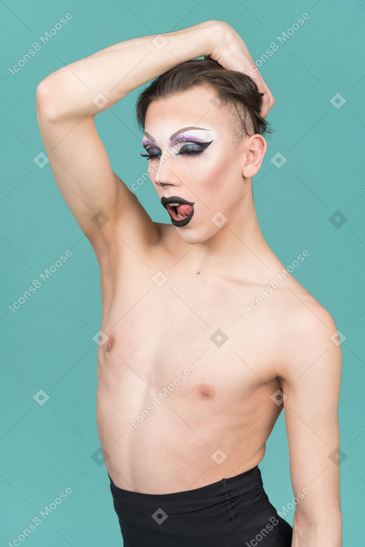 Drag queen posing with tongue sticking out
