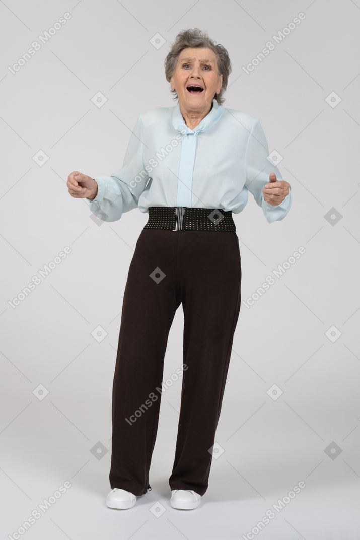 Front view of a shocked old woman