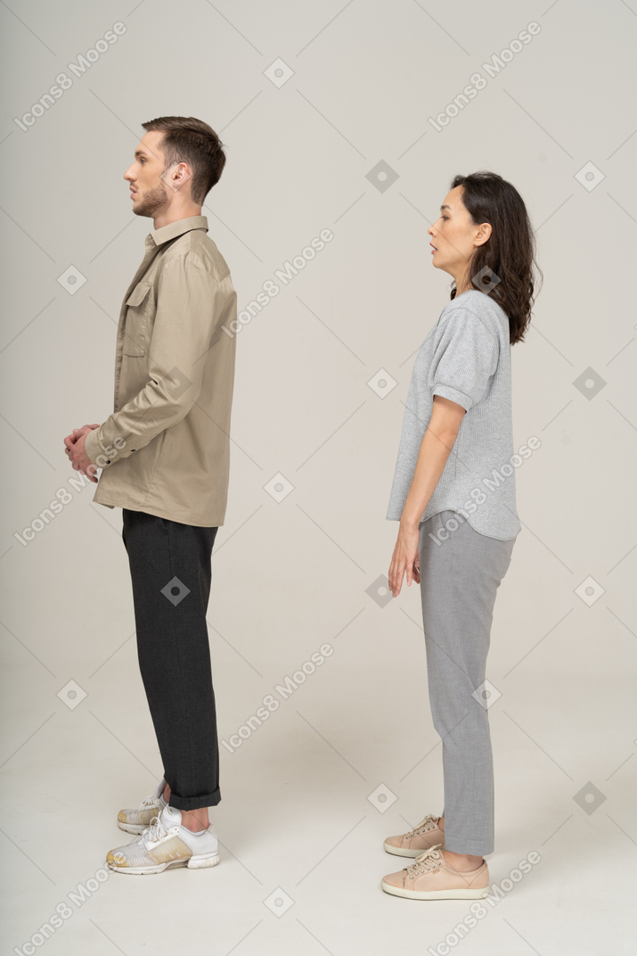 Side view of scared young couple