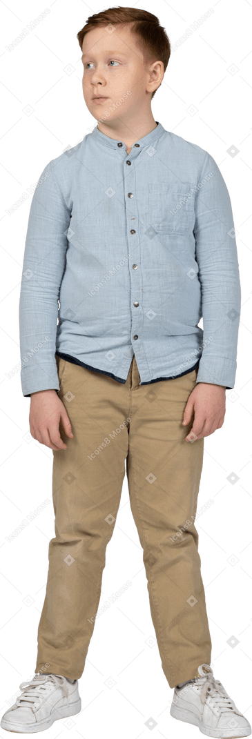 Front view of a boy in casual clothes looking aside