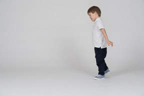 Side view of a boy walking