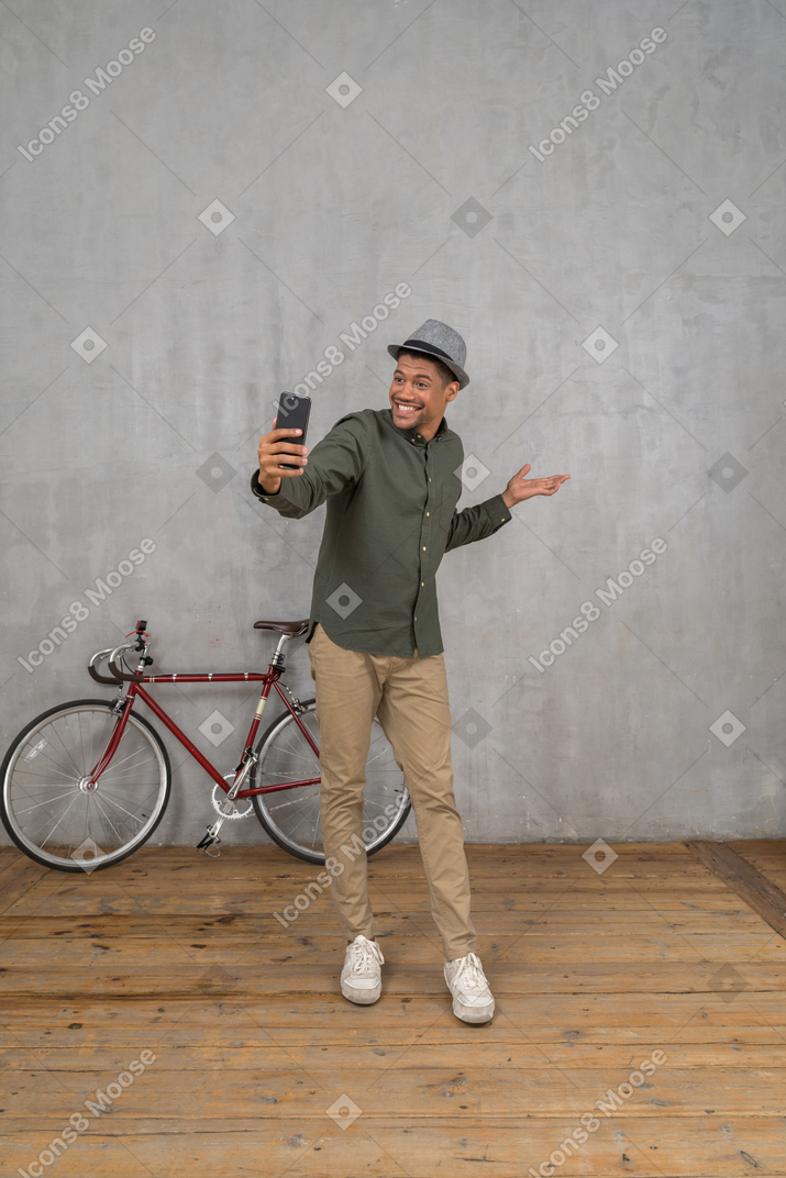 Man with smart phone video chatting