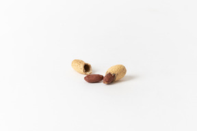 Broken peanut on a white background