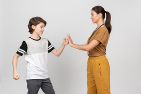 Female coach training a pupil