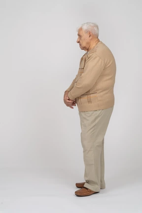 Side view of an old man in casual clothes