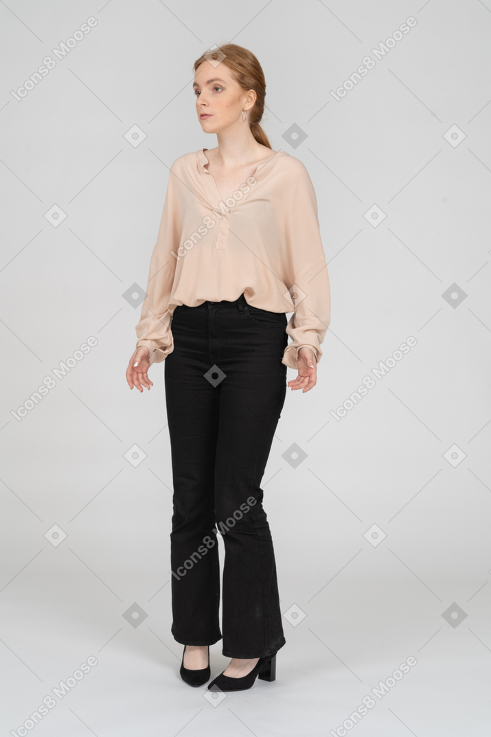 Woman in beautiful blouse standing