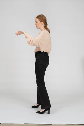Woman in beautiful blouse standing