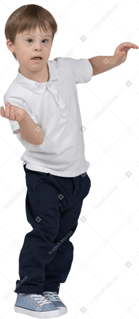 Three-quarter view of a boy waving arms aroung