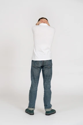 Young man in casual clothes standing