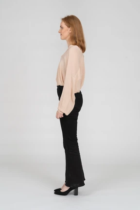 Woman in beautiful blouse standing