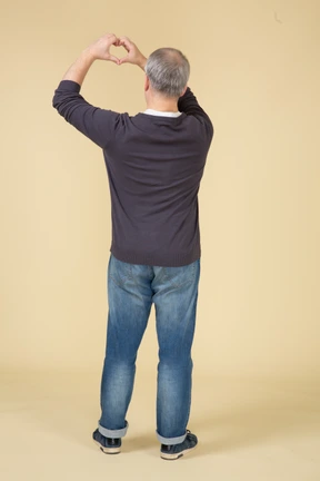 Man in casual clothes posing