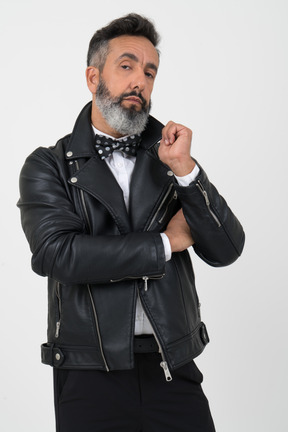 Curious mature man in leather jacket