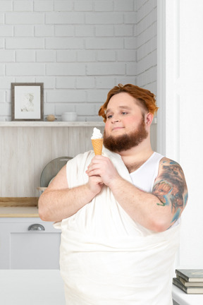 Man looking at ice cream cone with love