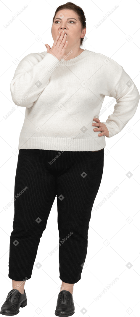 Impressed plump woman in casual clothes