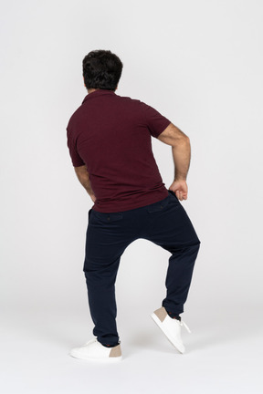 Back view of a man dancing