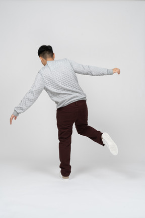 Man in casual clothes dancing