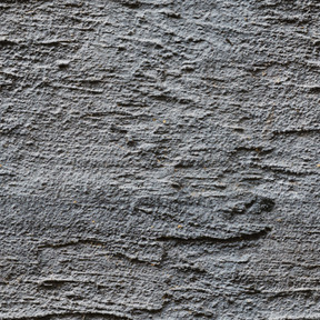 Texture de mur de plâtre gris