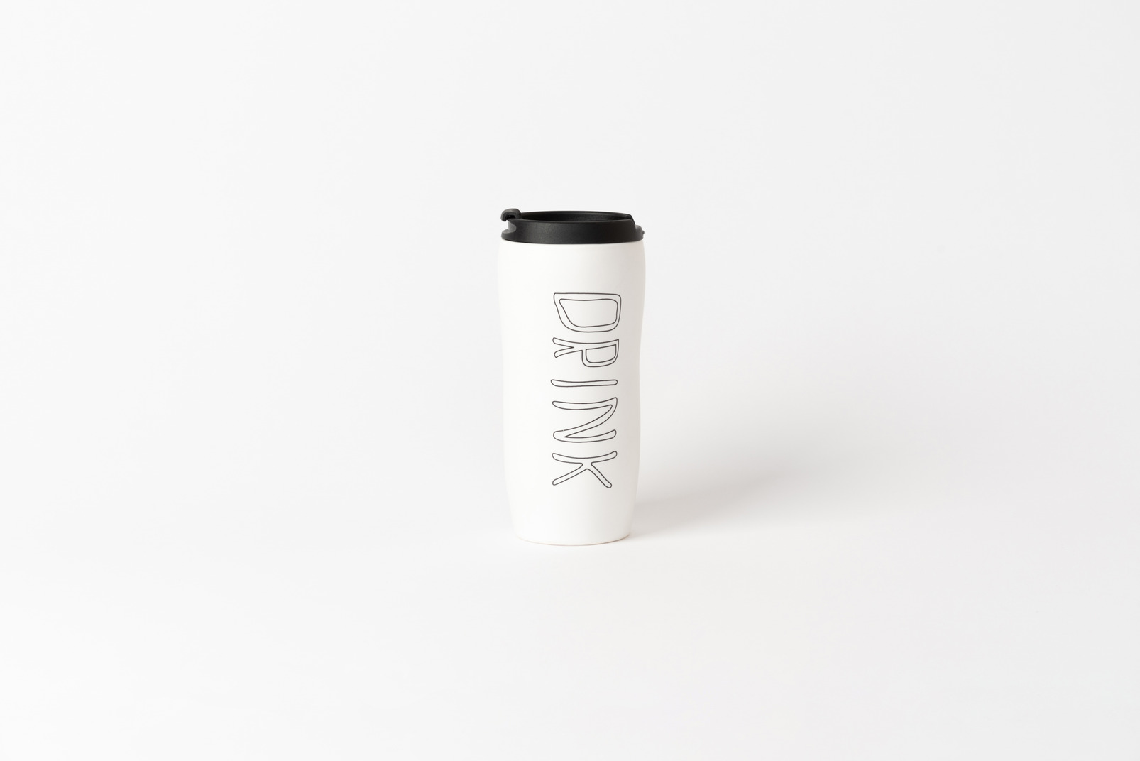 White thermocup with 'drink' sign on it