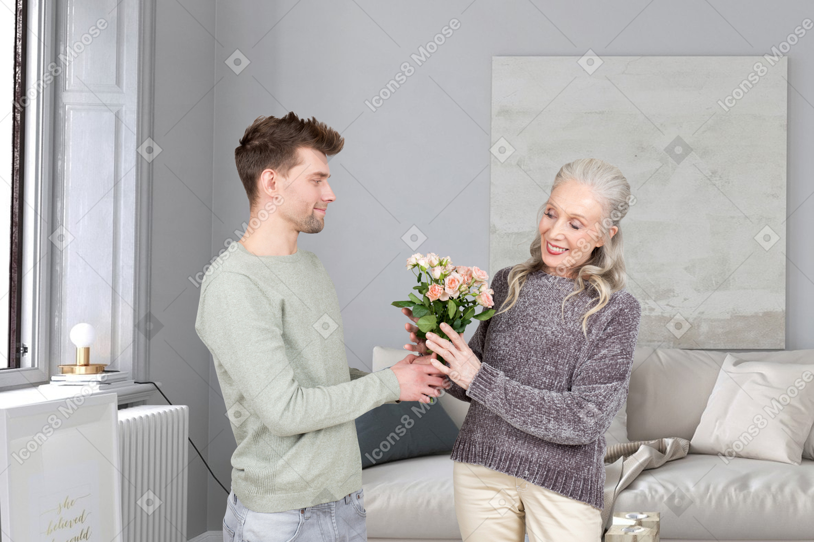 A man giving a woman a bouquet of flowers