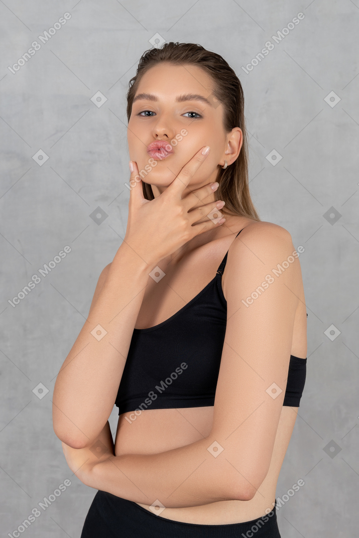 Young attractive woman with pouting lips