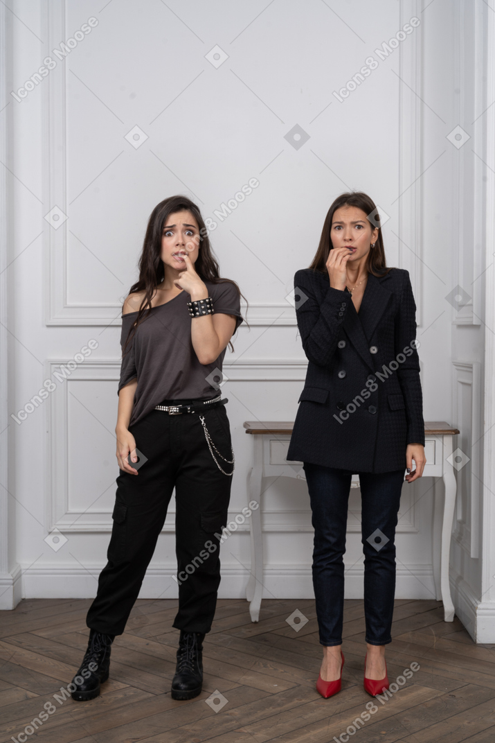 Two anxious young women