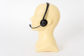 Call center headphones on mannequin head